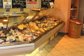 refrigerated counter for dairy products with glazed display case