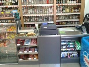 double-sided checkout counter with packing area